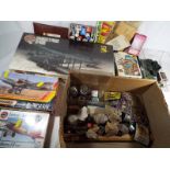 A small quantity of model aeroplane kits in original sealed packaging, Humbrol paint pots,