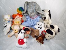 A collection of vintage soft toys to inc