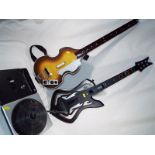 Two children's guitars, Rockband Harmoni