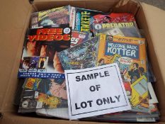 A box of unsorted comics, magazines and