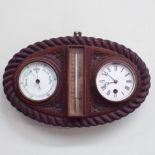 Oval carved oak wall clock/barometer the