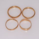 Four 22 ct yellow gold wedding bands, gr