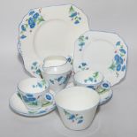 Art Deco Gladstone china ten place setting tea service decorated with blue flowers on white