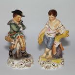 Two Royal Crown Derby figures depicting the Seasons, Summer and Winter, and a damaged figure from