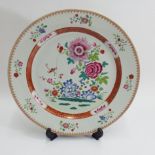 19th century Chinese porcelain charger decorated in the famille rose palette with flowers,  38cm