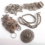 A collection of Eastern white metal jewe