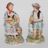 Pair of Naples figures, young boy with d