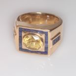 Large and unusual gents ring set with an oval yellow sapphire within calibre cut sapphire border,