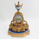 French ormolu mantel clock inset porcelain dial and urn with gilded metal stand  - 36cm high