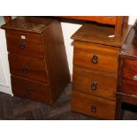 air of walnut pedestal bedside chests,