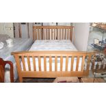 4'6 Light oak slatted rail bedstead with Relyon spring interior mattress