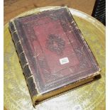 Old Victorian leather bound family bible with black and white illustrations