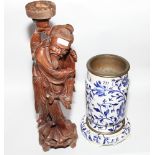 Carved hardwood Chinese fisherman figure with lamp base and a blue and white floral decorated china