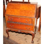 2'6 mahogany bureau with 2 long drawers under standing on claw and ball feet