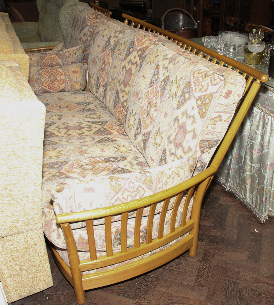 Ercol light oak framed 3 seater settee with fawn and figured patterned cushions together with one