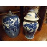 2 Chinese blue and white jars with covers