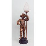 Painted spelter cavalier table lamp with moulded frosted flame effect shade 33" tall