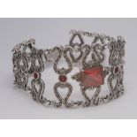 Large silver marcasite bracelet set with red paste stones
