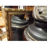 Long bevelled wall mirror in gilt frame