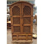 Pine lattice fronted larder cabinet with fitted wine rack and various drawers 75" high x 39" wide