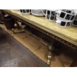 Long heavy brass framed coffee table with cream patterned onyx top