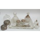 Cut glass and silver topped scent bottle, dressing table jars,