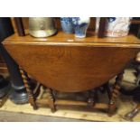 3' oval oak gate leg table on barley twist legs