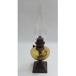 Small Victorian oil lamp with amber glass bowl