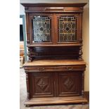 French 19th century carved oak buffet cabinet in they style of Henri Deux with coloured leaded