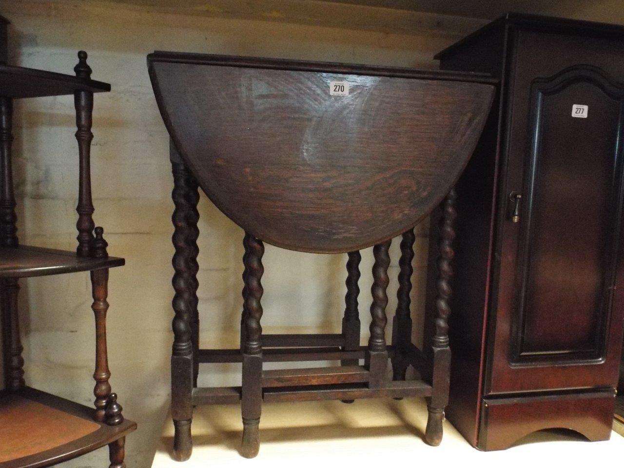 2' 3 oval oak gate leg table with barley twist legs