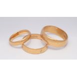 3 x 22ct yellow gold wedding bands.