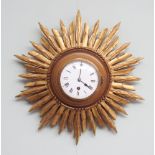 Edwardian gilt star burst panel wall clock appx 15" diameter