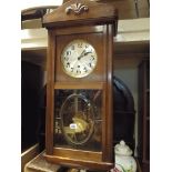 1930's Westminster chiming wall clock in a glazed walnut case