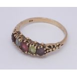 9ct gold Victorian style half hoop ring set with coloured gemstones.