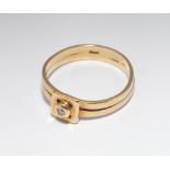 18ct yellow gold pinkie ring set with small diamond in square setting, ring size appx J,