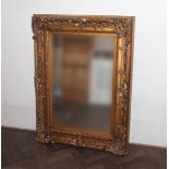 Large Victorian style bevelled wall mirror in decorative gilt frame,