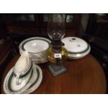 Crown Ducal green and gilt bordered dinner service
