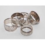 Five silver serviette rings