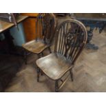 Set of four wheelback Windsor dining chairs