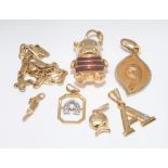 18ct gold Madonna charm, 2 initial A charms set with diamonds,