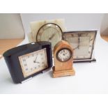 Collection of four clocks including art deco examples