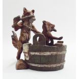 Novelty cold painted bronze model of a fox bathing a fox cub