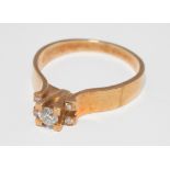 Yellow gold modern design three stone diamond ring, shank stamped 18ct, Ring size L.