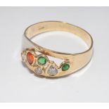 Modern ladies dress ring set with diamonds, emeralds and orange sapphire, Continental marks,