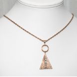 Retro 70's style gold pendant in a triangular shape with bark finish set with five brilliant cut