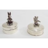 2 sterling silver pill boxes, one mounted with a rabbit,