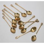 Set of 12 1930's 3 dish silver gilt coffee spoons with shell patterned handles hallmarked for 1938,