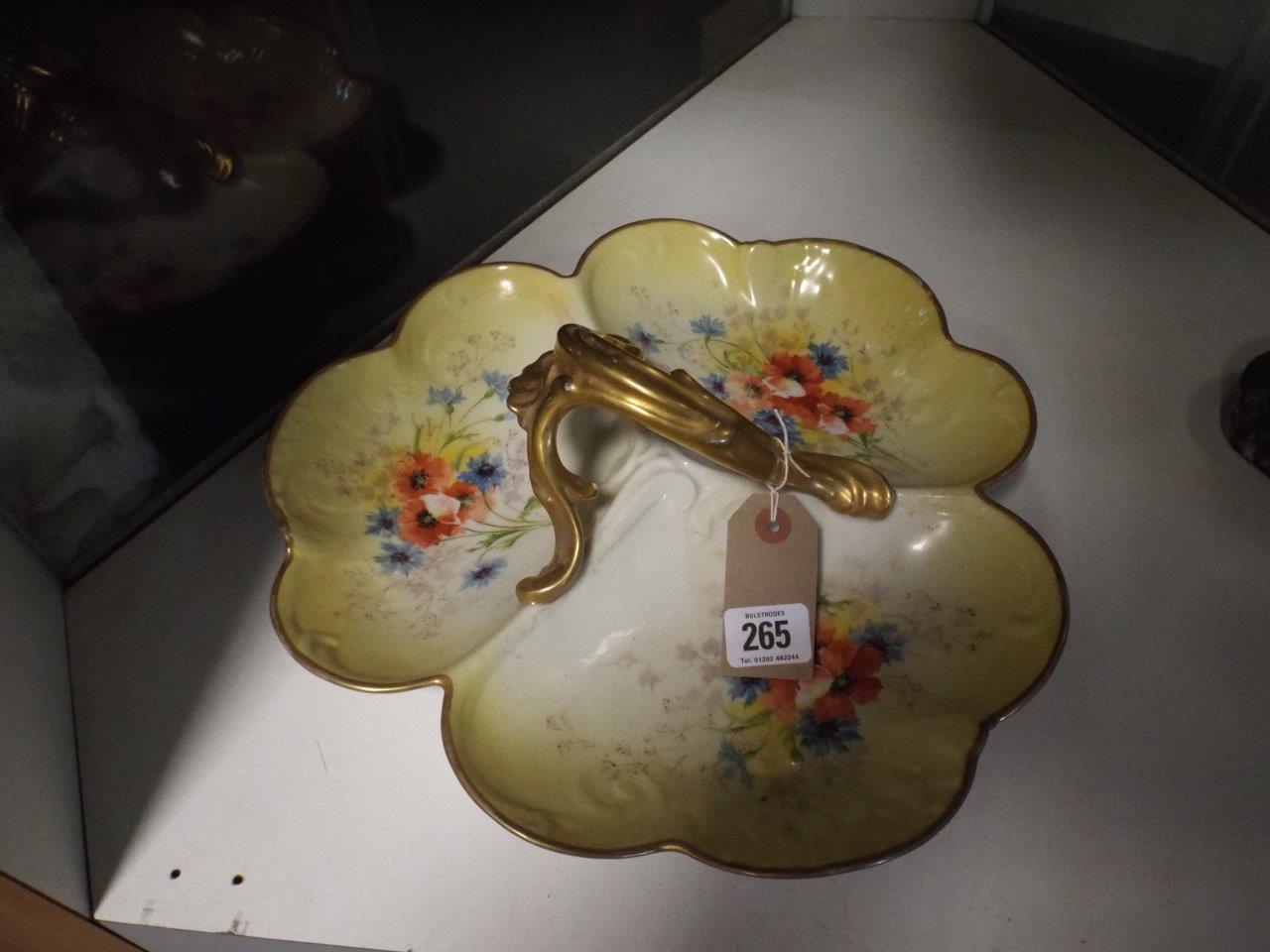 French porcelain clover leaf shaped hors d'oeuvre dish decorated with poppies and gilt handles, 13