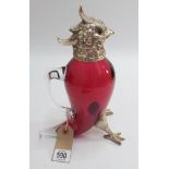 Victorian style cranberry glass claret jug modelled as a parrot with silver plated hinged head and