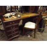 Mahogany pedestal desk with leather to fitted drawers and a mahogany shield back chair